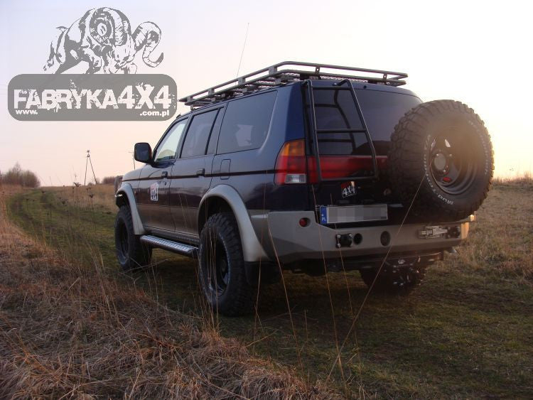Zderzak tył Mitsubishi Pajero Sport 96-00