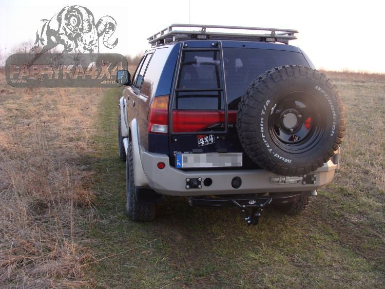 Zderzak tył Mitsubishi Pajero Sport 96-00