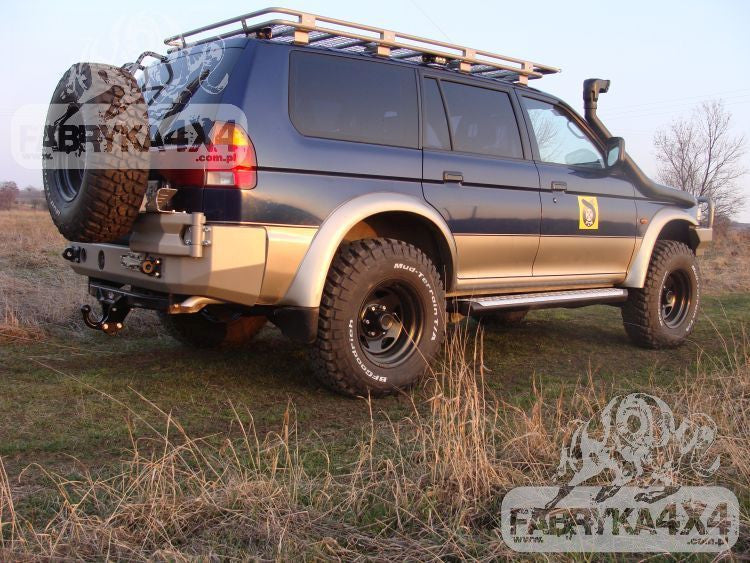 Zderzak tył Mitsubishi Pajero Sport 96-00