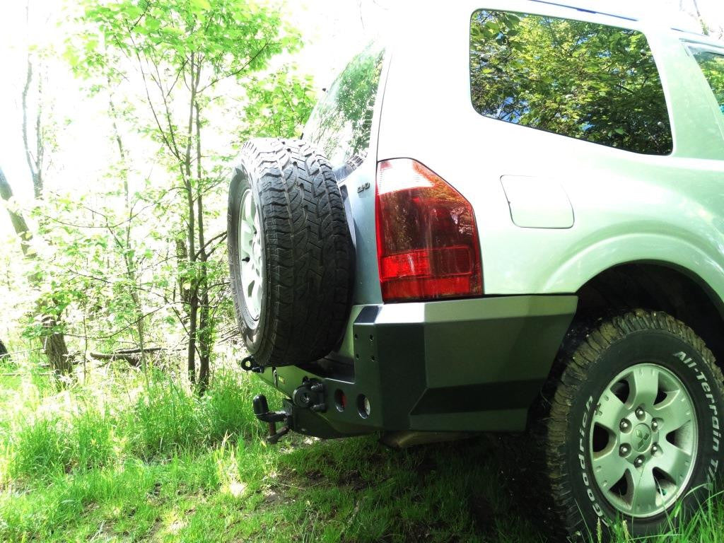 Zderzak tył Mitsubishi Pajero III 99-06 wersja 3-drzwiowa