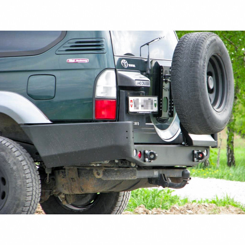 Zderzak tył Toyota LCJ95 96-02 wersja z poszerzeniami z otworami na lampy