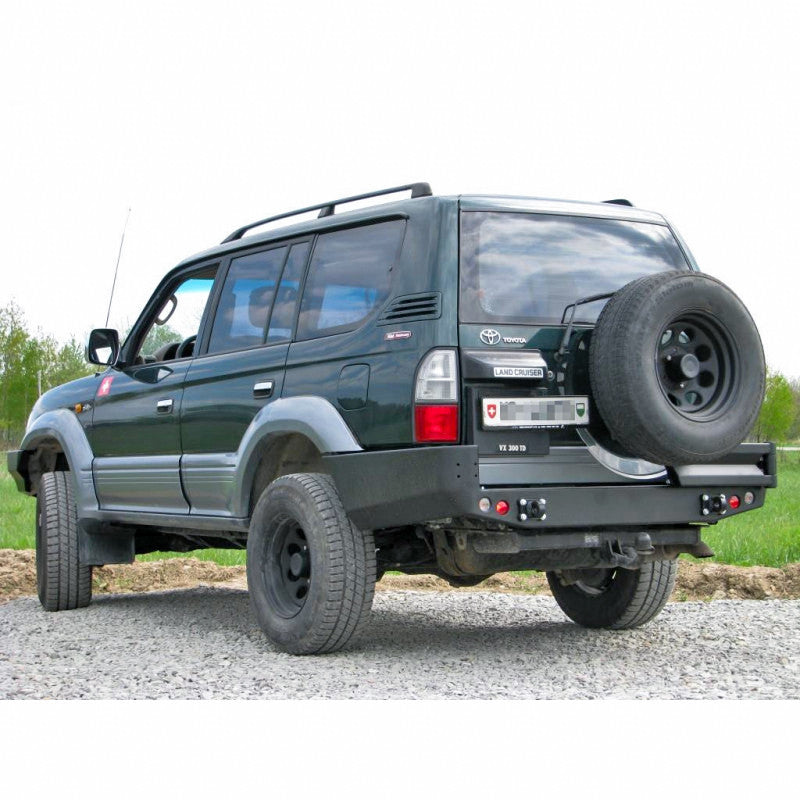 Zderzak tył Toyota LCJ95 96-02 wersja z poszerzeniami z otworami na lampy